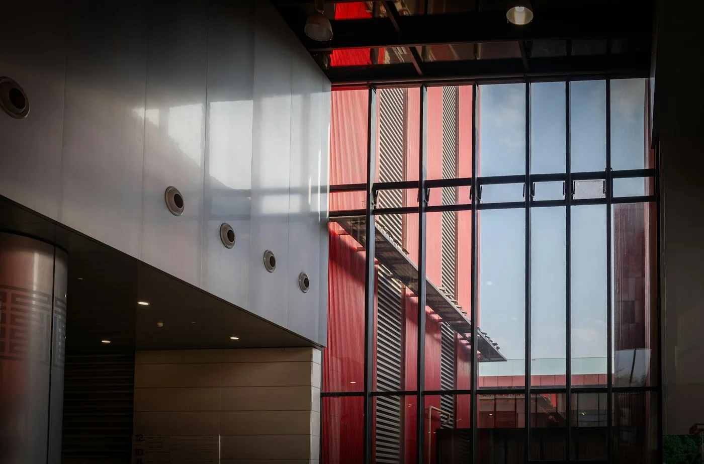 Architectural glazing with dark framing and daylight